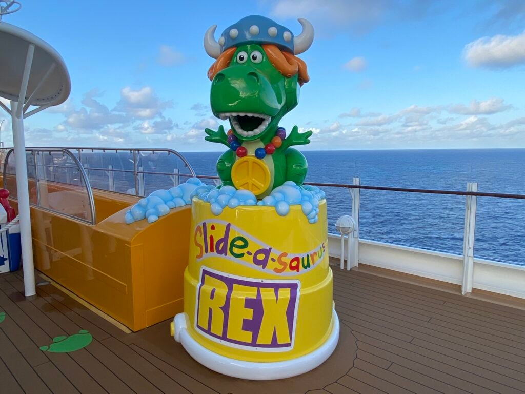 Slide-a-saurus Rex - a fun water slide with a minimum height requirement of 38 inches